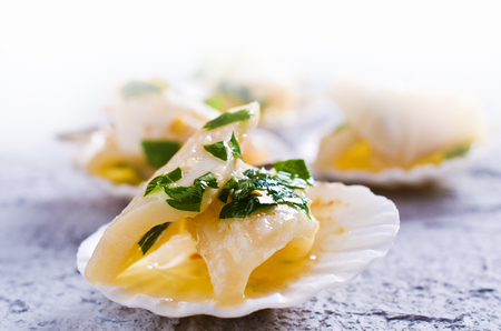 Appetizer of squid in a spicy marinade. Selective focus.の写真素材