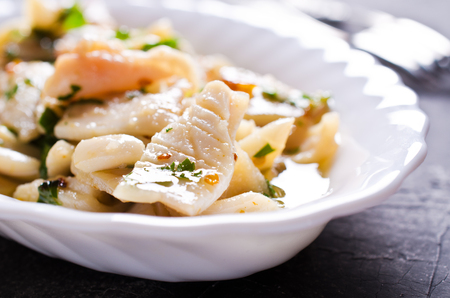 Appetizer of squid in a spicy marinade. Selective focus.の写真素材