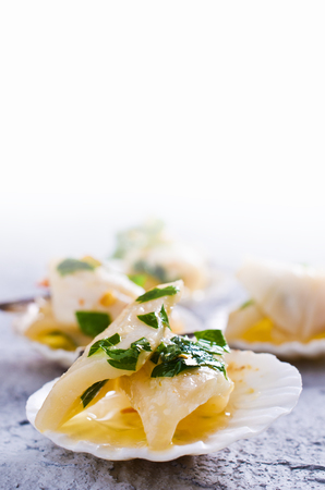 Appetizer of squid in a spicy marinade. Selective focus.の写真素材