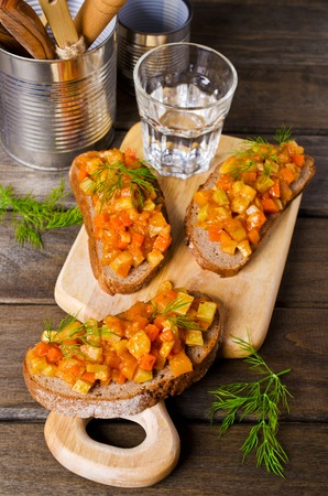 Open sandwich with steamed vegetables on a wooden background. Selective focus.の写真素材