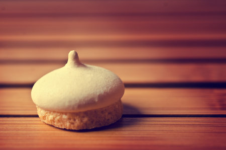 Biscuits with meringue with coffee aroma. Selective focus.