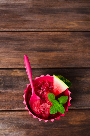 Homemade sorbet of watermelon on a dark wooden background. Selective focus.の写真素材
