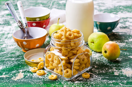 Round dry cereal in a batch container. Selective focus.