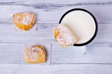 Homemade buns stuffed with cottage cheese on a wooden background. Selective focus.の写真素材