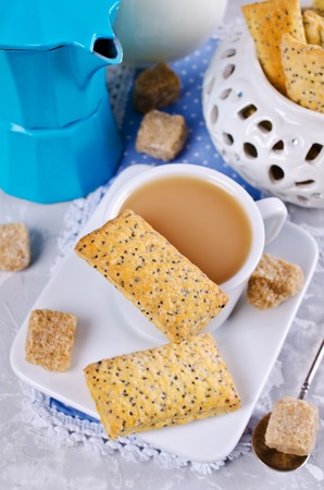 Cookies from puff pastry with poppy seeds and sugar. Selective focus.の写真素材