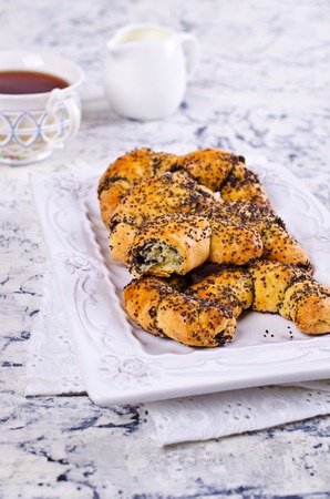 Traditional crescent rolls with poppy seeds. Selective focus.の写真素材