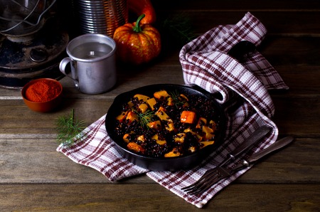 Black rice with pumpkin. Selective focus.の写真素材