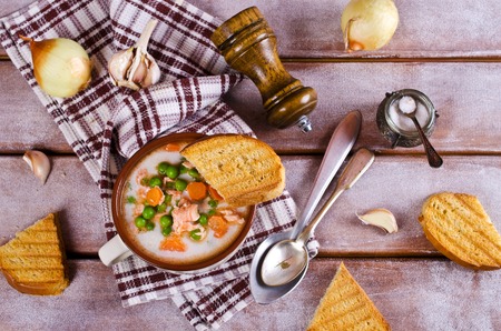Fish soup with vegetables and cream. Selective focus.の写真素材
