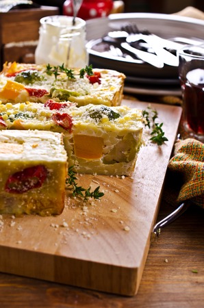 Casserole with vegetables and pasta on the wooden background. Selective focus.の写真素材
