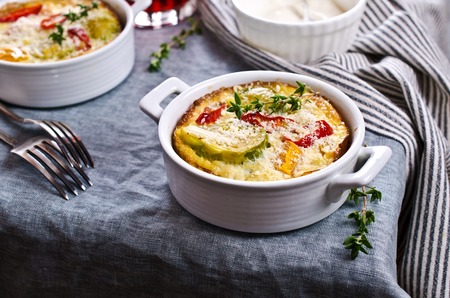 Casserole with vegetables on a textile background. Selective focus.の写真素材