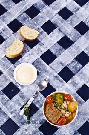 Meat soup with beans and vegetables. Selective focus.の写真素材