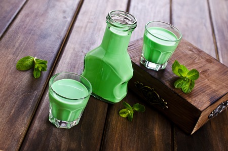 Green creamy liquid in a glass. Selective focus.の写真素材