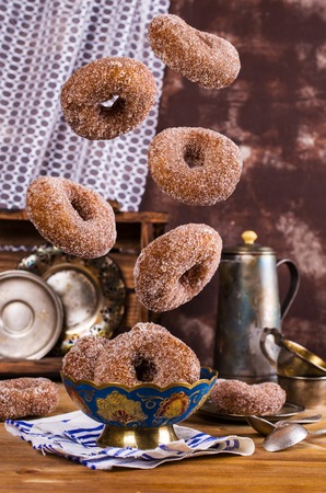 Donuts with sugar and cinnamon in the fall. Selective focus.の写真素材