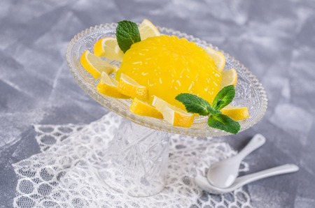 Traditional panna cotta with lemon and mint. Selective focus.の写真素材