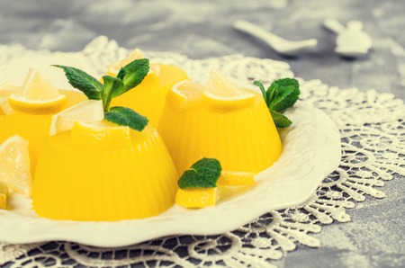 Traditional panna cotta with lemon and mint. Selective focus.の写真素材