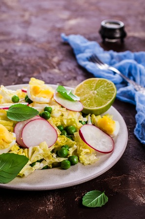 Salad from raw vegetables with egg. Selective focus.の写真素材