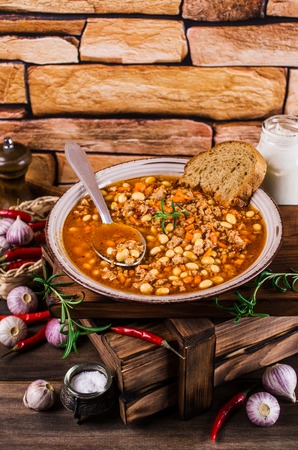 Meat soup with beans and vegetables. Selective focus.の写真素材