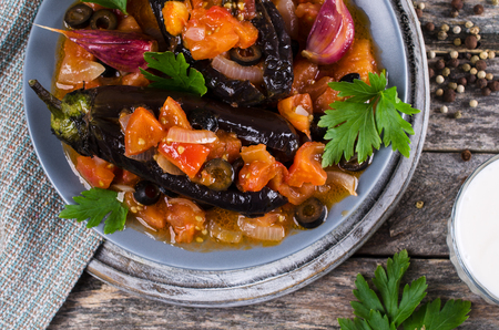 Stewed eggplant with vegetables and broth. Selective focus.の写真素材