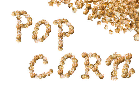 Popcorn with caramel taste on a white background. Selective focus.の写真素材
