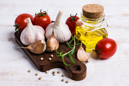 Raw vegetables and spices on a wooden background. Selective focus.の写真素材