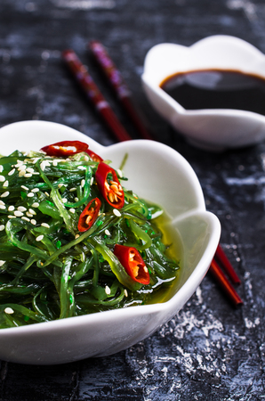 Chukka salad from seaweed with hot pepper and sesame. Selective focus.の写真素材
