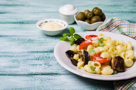 Traditional Italian pasta with vegetables and cheese in a bowl. Selective focus.の写真素材