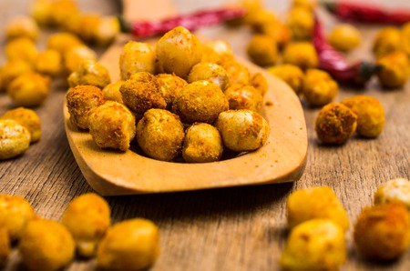 Traditional roasted chickpeas with spicy spices. Selective focus.の写真素材