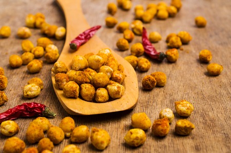 Traditional roasted chickpeas with spicy spices. Selective focus.の写真素材