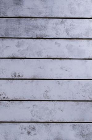 Copy space wooden background painted with different paint.の写真素材
