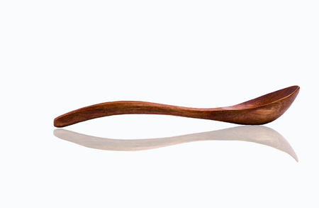 Wooden clean utensils on a white background. Elements of design.の写真素材