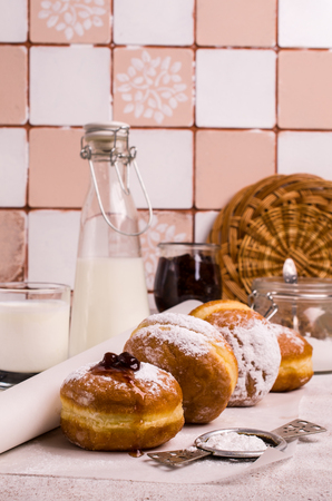 Traditional round donuts with a jam filling on the table. Selective focus.の写真素材