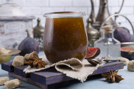 Traditional Fig jam with spices in glass. Selective focus.の写真素材