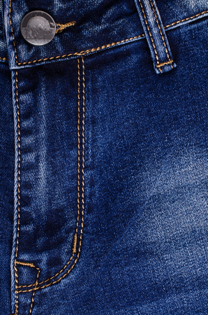 Denim. Blue jeans. Textile denim background. Selective focus.の写真素材