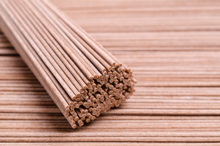 Dry brown noodles. The concept of copy space. Selective focus.の写真素材