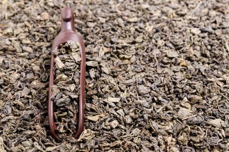 Fermented dry green tea leaves. The concept of background copy space. Selective focus.の写真素材