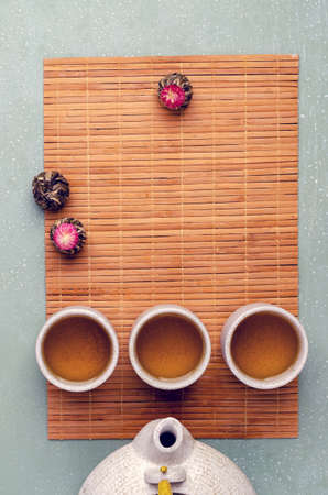 Traditional green tea in a ceramic dish on a stone background. Selective focus.の写真素材