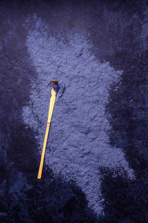 Traditional blue tea powder on a dark background. Selective focus.の写真素材