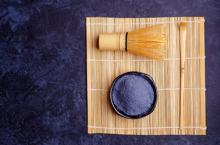 Traditional blue tea powder on a dark background. Selective focus.の写真素材