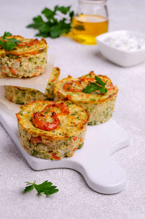 Vegetable muffins with shrimp on a light gray background. Selective focus.の写真素材