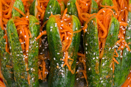 Fermented cucumbers with carrots and spices. Traditional Asian cuisine. Selective focus.