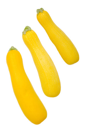 Yellow zucchini on a white background. Top view. Design concept.の写真素材