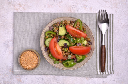 Salad slices of raw vegetables with lentils and microgreens. top view.の写真素材