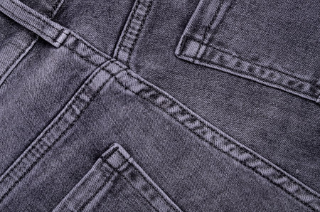 Gray denim background. Jean texture. abstract design. copyspace. top view.の写真素材