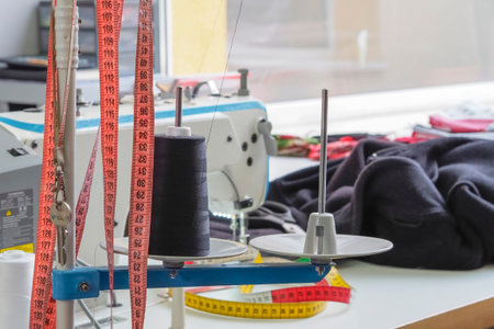 seamstress's workshop with a machine and a tailor's measure