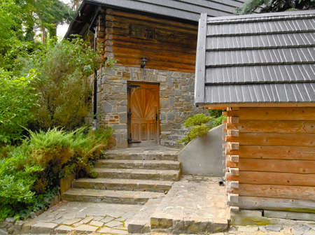 stone stairs, wooden walls, stone foundations, an atmospheric houseの写真素材