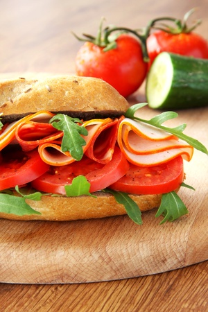 Fresh sandwich with chorizo and tomatoesの写真素材