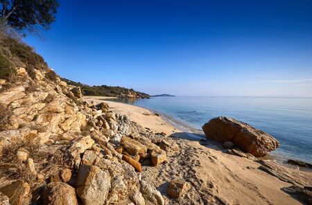 Amazing sunset view on Proti ammoudia beach near Olympiada town summer resort, Kavala region, Greece.. Incredibly romantic sunrise on the beach, Ionian Sea. View of the ocean. Tropical beachの写真素材