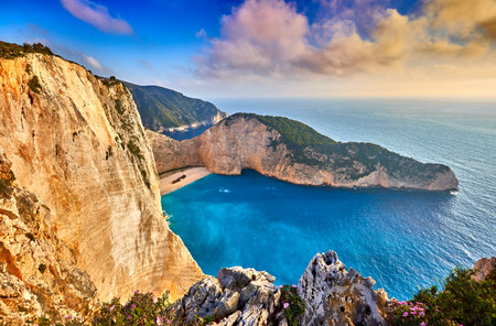 Navagio Beach with shipwreck view on Zakynthos island, Greece. Incredibly romantic sunrise on...