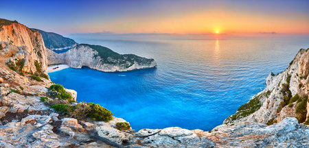 Navagio Beach with shipwreck view on Zakynthos island, Greece. Incredibly romantic sunrise on...