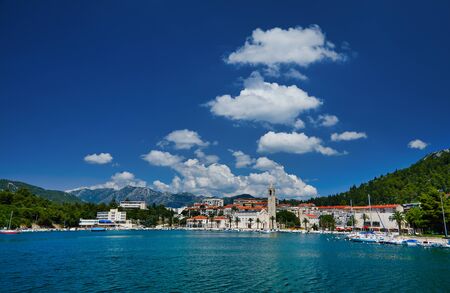View of Ploce Tower. Sunny summer cityscape of Ploche city, Croatia, Europe. Bright morning seascape of Adriatic sea. Beautiful world of Mediterranean countries. Architecture traveling background.

の写真素材